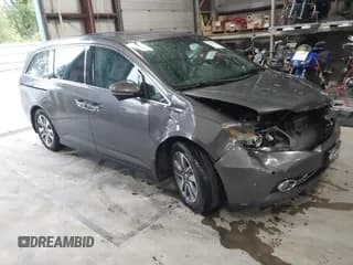 ✅ 2014 Honda Odyssey Touring • VIN: 5FNRL5H90EB073067 • Lot: 43393339. Listed on IAAI with 160,480 mi. Free auction sales archive from the USA and detailed vehicle history report at DreamBid. Image 1.
