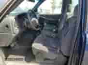 2002 GMC Sierra 1500 with VIN 1GTEC14W32Z205490, listed as a Copart auction lot 65004275 with 96,004 mi miles and Salvage title. Bid and sale history available at DreamBid. Image 7.