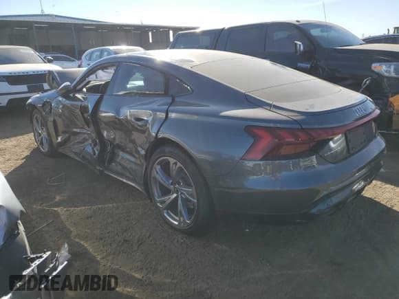 ✅ 2022 Audi e-tron GT Premium Plus • VIN: WAUFJBFWXN7008942 • Lot: 77193994. Listed on Copart with 22,917 mi. Free auction sales archive from the USA and detailed vehicle history report at DreamBid. Image 2.