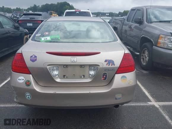 2007 Honda Accord VP with VIN JHMCM56157C010867, listed as a IAAI auction lot 42962776 with 195,413 mi miles and . Bid and sale history available at DreamBid. Image 17.