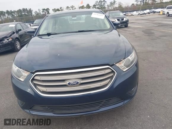✅ 2016 Ford Taurus SEL • VIN: 1FAHP2H80GG113006 • Lot: 43784452. Listed on IAAI with 240,000 mi. Free auction sales archive from the USA and detailed vehicle history report at DreamBid. Image 12.