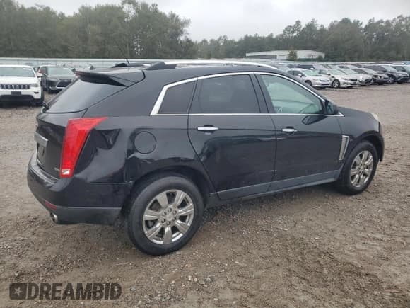 ✅ 2015 Cadillac SRX Luxury Collection • VIN: 3GYFNEE34FS586211 • Lot: 90421885. Wystawiony na Copart z przebiegiem 162 097 mil. Bezpłatny archiwum sprzedaży aukcyjnych z USA i szczegółowy raport historii pojazdu na DreamBid. Zdjęcie 3.