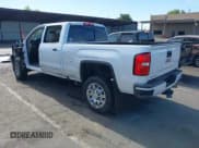 ✅ 2018 GMC Sierra 2500HD Denali • VIN: 1GT12UEY9JF246905 • Lot: 42655664. Listed on IAAI with 73,210 mi. Free auction sales archive from the USA and detailed vehicle history report at DreamBid. Image 3.