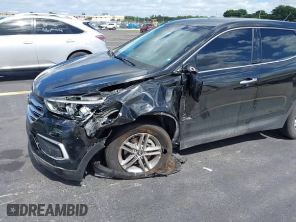 2018 Hyundai Santa Fe 2.4L z VIN 5XYZT3LB3JG541357, wystawiony jako IAAI lot #43481395 z przebiegiem 99 707 mil mil oraz . Historia ofert i sprzedaży dostępna na DreamBid. Obrazek 6.