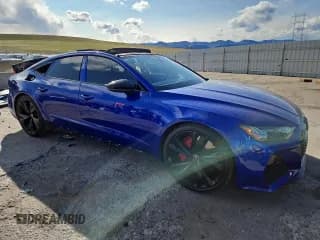 ✅ 2023 Audi RS 7 • VIN: WUAPCBF25PN900872 • Лот: 51517055. Опубликован ранее на Copart с пробегом 17 546 миль. Бесплатный доступ к архиву аукционных продаж из США и подробный отчёт об истории автомобиля на DreamBid. Изображение 4.