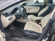 ✅ 2010 Volkswagen CC Luxury • VIN: WVWHL7AN7AE526188 • Lot: 59014795. Listed on Copart with 130,981 mi. Free auction sales archive from the USA and detailed vehicle history report at DreamBid. Image 7.