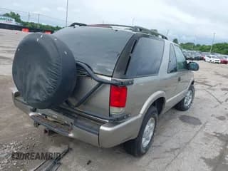 ✅ 1999 Chevrolet Blazer LS • VIN: 1GNCT18W4XK215910 • Lot: 42775958. Wystawiony na IAAI z przebiegiem 91 842 mil. Bezpłatny archiwum sprzedaży aukcyjnych z USA i szczegółowy raport historii pojazdu na DreamBid. Zdjęcie 4.