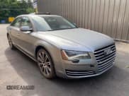 ✅ 2011 Audi A8 • VIN: WAURVAFD7BN018734 • Lot: 63735055. Wystawiony na Copart z przebiegiem 79 694 mil. Bezpłatny archiwum sprzedaży aukcyjnych z USA i szczegółowy raport historii pojazdu na DreamBid. Zdjęcie 1.