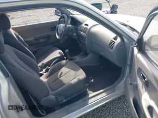 2002 Hyundai Accent z VIN KMHCF35G82U173856, wystawiony jako IAAI lot #42620048 z przebiegiem 128 986 mil mil oraz . Historia ofert i sprzedaży dostępna na DreamBid. Obrazek 5.