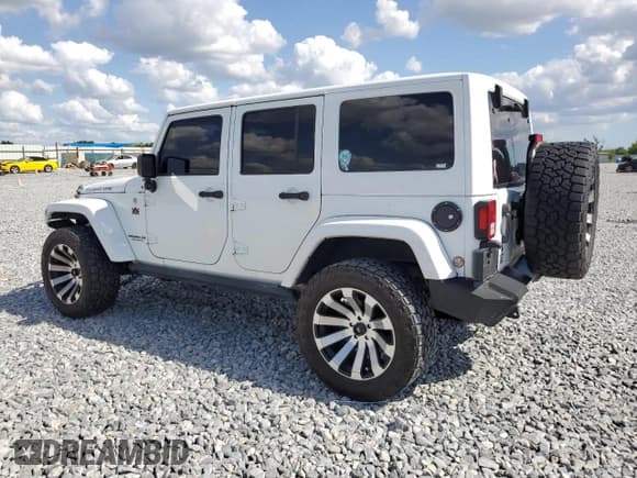 ✅ 2016 Jeep Wrangler Unlimited Rubicon • VIN: 1C4BJWFG9GL103312 • Lot: 52559465. Listed on Copart with 79,692 mi. Free auction sales archive from the USA and detailed vehicle history report at DreamBid. Image 2.
