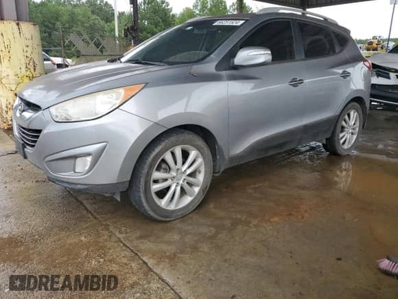 2010 Hyundai Tucson Limited z VIN KM8JU3ACXAU033158, wystawiony jako Copart lot #66251524 z przebiegiem 143 536 mil mil oraz Szkoda całkowita • Salvage title. Historia ofert i sprzedaży dostępna na DreamBid. Obrazek 1.
