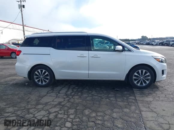 ✅ 2016 Kia Sedona EX • VIN: KNDMC5C14G6170086 • Lot: 41736246. Listed on IAAI with 82,556 mi. Free auction sales archive from the USA and detailed vehicle history report at DreamBid. Image 13.