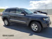 ✅ 2013 Jeep Grand Cherokee Laredo • VIN: 1C4RJFAG7DC645932 • Lot: 57969715. Listed on Copart with 165,717 mi. Free auction sales archive from the USA and detailed vehicle history report at DreamBid. Image 4.