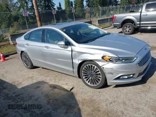 ✅ 2018 Ford Fusion Titanium • VIN: 3FA6P0D90JR246911 • Lot: 43376984. Listed on IAAI with 71,698 mi. Free auction sales archive from the USA and detailed vehicle history report at DreamBid. Image 1.