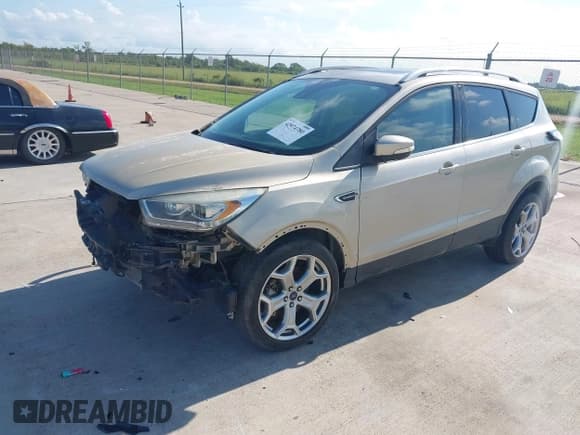 ✅ 2017 Ford Escape Titanium • VIN: 1FMCU0J99HUA03820 • Лот: 42974780. Опубликован ранее на IAAI с пробегом Не указан. Бесплатный доступ к архиву аукционных продаж из США и подробный отчёт об истории автомобиля на DreamBid. Изображение 2.