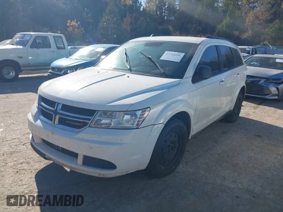 ✅ 2014 Dodge Journey American Value • VIN: 3C4PDCAB5ET148594 • Lot: 43714101. Listed on IAAI with 259,097 mi. Free auction sales archive from the USA and detailed vehicle history report at DreamBid. Image 2.