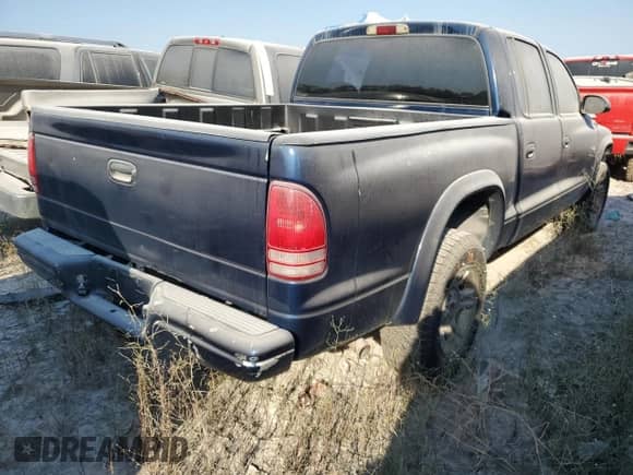 ✅ 2003 Dodge Dakota SLT • VIN: 1D7HG48N23S195393 • Лот: 72139814. Размещён на Copart с пробегом 196 602 миль миль. Получите бесплатный доступ к архиву аукционных продаж из США и посмотрите подробный отчёт об истории автомобиля на DreamBid. Изображение 3.