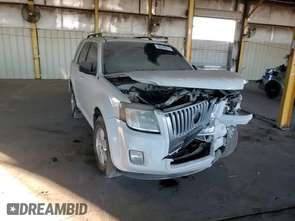 ✅ 2011 Mercury Mariner • VIN: 4M2CN8B73BKJ04913 • Lot: 88345615. Listed on Copart with 215,124 mi. Free auction sales archive from the USA and detailed vehicle history report at DreamBid. Image 11.