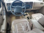 ✅ 1996 GMC Jimmy SL • VIN: 1GKDT13W1T2559861 • Lot: 63273465. Listed on Copart with 173,117 mi. Free auction sales archive from the USA and detailed vehicle history report at DreamBid. Image 8.