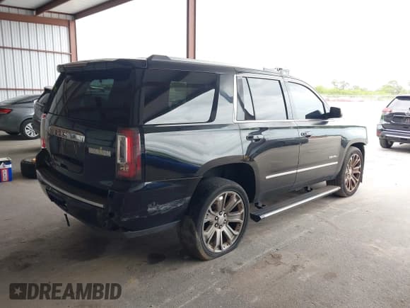 ✅ 2015 GMC Yukon Denali • VIN: 1GKS1CKJ5FR143290 • Lot: 43635982. Listed on IAAI with 202,096 mi. Free auction sales archive from the USA and detailed vehicle history report at DreamBid. Image 4.