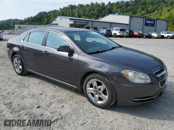 ✅ 2010 Chevrolet Malibu 1LT • VIN: 1G1ZC5EB6AF258908 • Lot: 64623004. Listed on Copart with 124,089 mi. Free auction sales archive from the USA and detailed vehicle history report at DreamBid. Image 4.