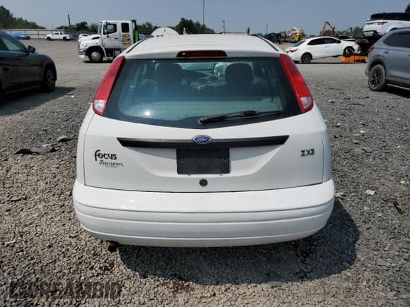 ✅ 2001 Ford Focus ZX3 • VIN: 3FAFP313X1R119424 • Лот: 67952865. Опубликован ранее на Copart с пробегом 58 676 миль. Бесплатный доступ к архиву аукционных продаж из США и подробный отчёт об истории автомобиля на DreamBid. Изображение 6.