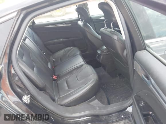 ✅ 2013 Ford Fusion Titanium • VIN: 3FA6P0SU0DR241025 • Lot: 42600978. Listed on IAAI with 116,015 mi. Free auction sales archive from the USA and detailed vehicle history report at DreamBid. Image 8.