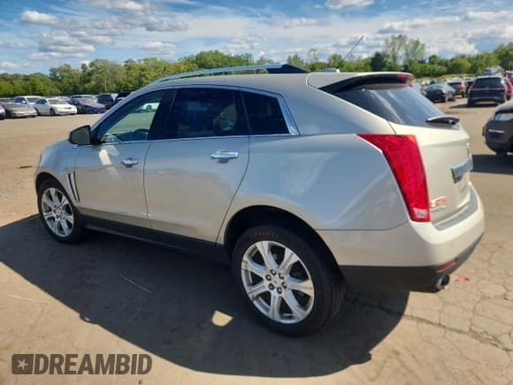 ✅ 2015 Cadillac SRX Premium Collection • VIN: 3GYFNGE38FS547147 • Lot: 70882935. Wystawiony na Copart z przebiegiem 160 153 mil. Bezpłatny archiwum sprzedaży aukcyjnych z USA i szczegółowy raport historii pojazdu na DreamBid. Zdjęcie 2.