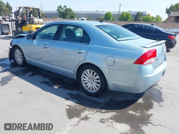 ✅ 2010 Mercury Milan Hybrid • VIN: 3MEDM0L35AR641477 • Lot: 42443628. Listed on IAAI with 102,890 mi. Free auction sales archive from the USA and detailed vehicle history report at DreamBid. Image 3.