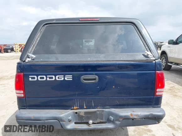 2002 Dodge Dakota Sport z VIN 1B7GL32X52S525368, wystawiony jako IAAI lot #42420709 z przebiegiem 241 497 mil mil oraz . Historia ofert i sprzedaży dostępna na DreamBid. Obrazek 17.