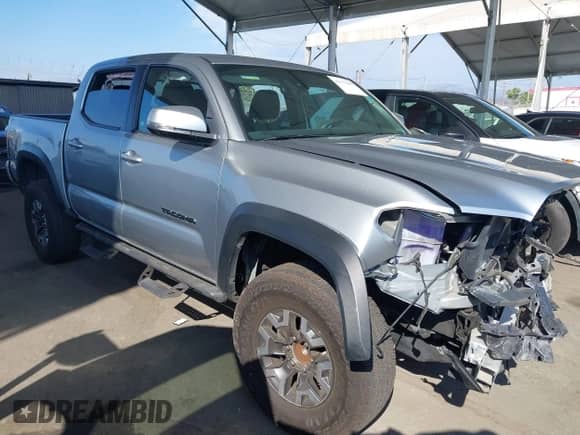 2022 Toyota Tacoma SR5 with VIN 3TMAZ5CN9NM186656, listed as a IAAI auction lot 43253480 with 25,540 mi miles and . Bid and sale history available at DreamBid. Image 1.