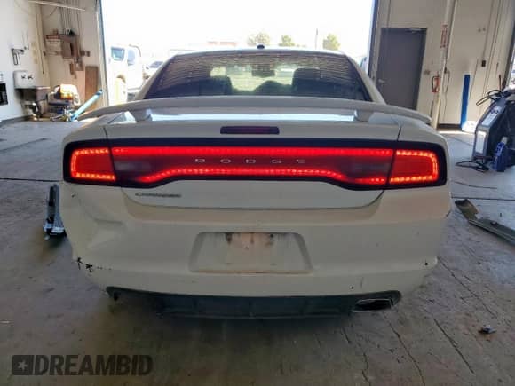 2012 Dodge Charger SXT Plus z VIN 2C3CDXHG6CH278899, wystawiony jako Copart lot #82220655 z przebiegiem 185 929 mil mil oraz Szkoda całkowita • Salvage title. Historia ofert i sprzedaży dostępna na DreamBid. Obrazek 6.