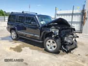 ✅ 2009 Jeep Commander Sport • VIN: 1J8HG48K99C551852 • Lot: 55077775. Listed on Copart with 157,829 mi. Free auction sales archive from the USA and detailed vehicle history report at DreamBid. Image 4.