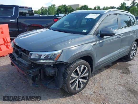 ✅ 2023 Volkswagen Taos SE • VIN: 3VVSX7B24PM357590 • Лот: 42619875. Опубликован ранее на IAAI с пробегом 38 529 миль. Бесплатный доступ к архиву аукционных продаж из США и подробный отчёт об истории автомобиля на DreamBid. Изображение 2.