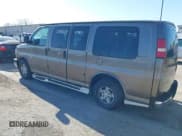 ✅ 2004 Chevrolet Express Passenger • VIN: 1GBFG15T341149179 • Lot: 41964604. Listed on IAAI with 179,725 mi. Free auction sales archive from the USA and detailed vehicle history report at DreamBid. Image 3.