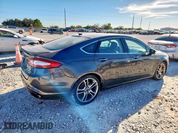 ✅ 2016 Ford Fusion Titanium • VIN: 3FA6P0K90GR104909 • Lot: 92049535. Listed on Copart with 140,022 mi. Free auction sales archive from the USA and detailed vehicle history report at DreamBid. Image 3.