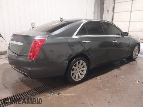 ✅ 2014 Cadillac CTS Luxury AWD • VIN: 1G6AX5S37E0172041 • Лот: 40343343. Опубликован ранее на IAAI с пробегом 102 506 миль. Бесплатный доступ к архиву аукционных продаж из США и подробный отчёт об истории автомобиля на DreamBid. Изображение 4.