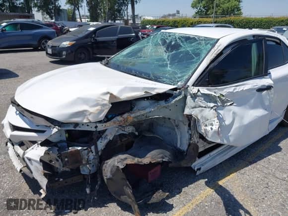 2022 Toyota Camry SE z VIN 4T1T11AK9NU047717, wystawiony jako IAAI lot #42316618 z przebiegiem 86 410 mil mil oraz . Historia ofert i sprzedaży dostępna na DreamBid. Obrazek 6.