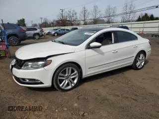 ✅ 2014 Volkswagen CC Executive • VIN: WVWRP7AN8EE525596 • Lot: 51208465. Listed on Copart with 192,673 mi. Free auction sales archive from the USA and detailed vehicle history report at DreamBid. Image 1.