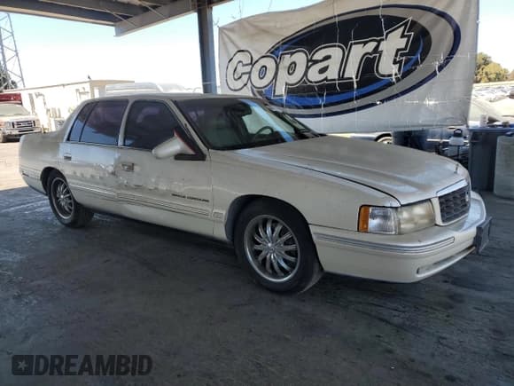 ✅ 1998 Cadillac DeVille • VIN: 1G6KF5496WU745580 • Lot: 69912165. Listed on Copart with 119,649 mi. Free auction sales archive from the USA and detailed vehicle history report at DreamBid. Image 4.