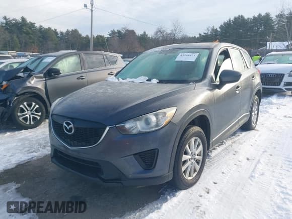 ✅ 2014 Mazda CX-5 Sport • VIN: JM3KE2BEXE0398881 • Lot: 43848471. Listed on IAAI with 173,392 mi. Free auction sales archive from the USA and detailed vehicle history report at DreamBid. Image 17.
