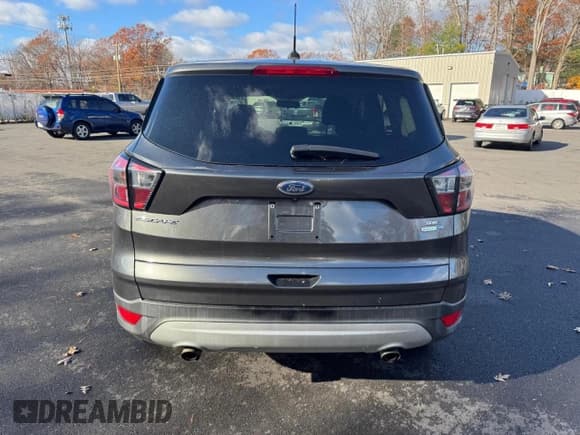 ✅ 2017 Ford Escape SE • VIN: 1FMCU9GD0HUD02497 • Lot: 93264155. Listed on Copart with 124,678 mi. Free auction sales archive from the USA and detailed vehicle history report at DreamBid. Image 6.