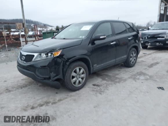 ✅ 2012 Kia Sorento LX • VIN: 5XYKTCA62CG244834 • Lot: 43853742. Listed on IAAI with 155,924 mi. Free auction sales archive from the USA and detailed vehicle history report at DreamBid. Image 2.