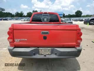 2005 Dodge Dakota SLT с VIN 1D7HE42KX5S230060, выставлен на аукционе Copart как лот 67889624 с пробегом 227 815 миль миль и Списание • Salvage title. История ставок и продаж доступна на DreamBid. Изображение 6.