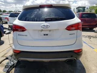 ✅ 2014 Hyundai Santa Fe • VIN: 5XYZU3LB1EG230030 • Лот: 56274614. Опубликован ранее на Copart с пробегом 192 803 миль. Бесплатный доступ к архиву аукционных продаж из США и подробный отчёт об истории автомобиля на DreamBid. Изображение 6.