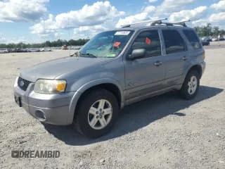 ✅ 2007 Ford Escape Hybrid • VIN: 1FMCU49H07KB60889 • Лот: 71118925. Опубликован ранее на Copart с пробегом 99 990 миль. Бесплатный доступ к архиву аукционных продаж из США и подробный отчёт об истории автомобиля на DreamBid. Изображение 1.