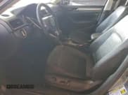 ✅ 2014 Volkswagen Passat SE • VIN: 1VWBS7A33EC052441 • Лот: 95112245. Опубликован ранее на Copart с пробегом 106 134 миль. Бесплатный доступ к архиву аукционных продаж из США и подробный отчёт об истории автомобиля на DreamBid. Изображение 7.