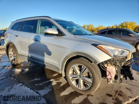 2015 Hyundai Santa Fe GLS с VIN KM8SNDHF5FU099521, выставлен на аукционе Copart как лот 87112565 с пробегом 172 309 миль миль и Списание • Salvage title. История ставок и продаж доступна на DreamBid. Изображение 4.