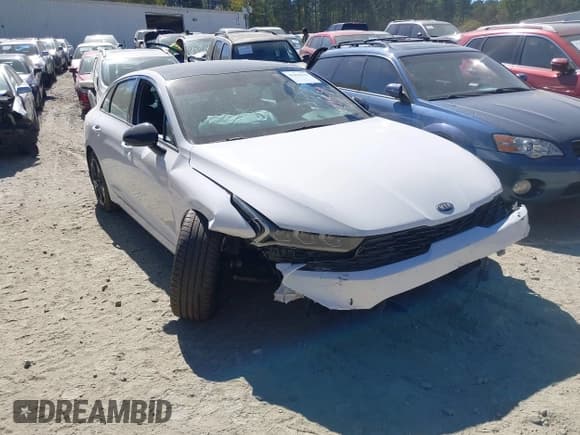 ✅ 2021 Kia K5 GT-Line • VIN: 5XXG64J27MG075349 • Лот: 43394570. Опубликован ранее на IAAI с пробегом 47 235 миль. Бесплатный доступ к архиву аукционных продаж из США и подробный отчёт об истории автомобиля на DreamBid. Изображение 1.