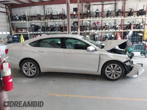 ✅ 2016 Chevrolet Impala LT • VIN: 1G1115S38GU163299 • Lot: 43014595. Listed on IAAI with 101,552 mi. Free auction sales archive from the USA and detailed vehicle history report at DreamBid. Image 14.